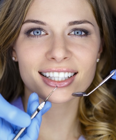 Woman receiving root canal therapy