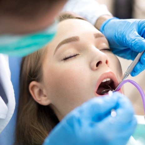 Patient receiving endodontic treatment under mild dental sedation