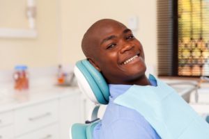 Man smiling after root canal therapy in Worcester