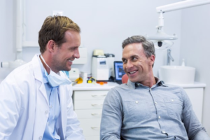 a patient visiting his dentist for root canal therapy