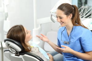 a patient speaking with her endodontist 